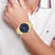 Herrenarmbanduhr mit blauem Zifferblatt und goldfarbenem Gliederarmband