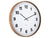 Horloge murale avec cadre rond en bois sombre et cadran blanc, aiguilles noires