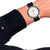 Tommy Hilfiger Herrenarmbanduhr: schwarzes Armband, silbernes Gehäuse, weißes Zifferblatt