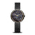 Bering Damenuhr mit rundem schwarzem Zifferblatt, goldenen Zeigern und schwarzem Milanaise-Armband