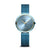Bering Damenuhr mit rundem hellem blauem Zifferblatt, goldenen Akzenten und blauem Milanaise-Armband
