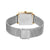 Armbanduhr mit Rückseite und Verschluss, silbernes Milanaiseband und goldfarbene Akzente