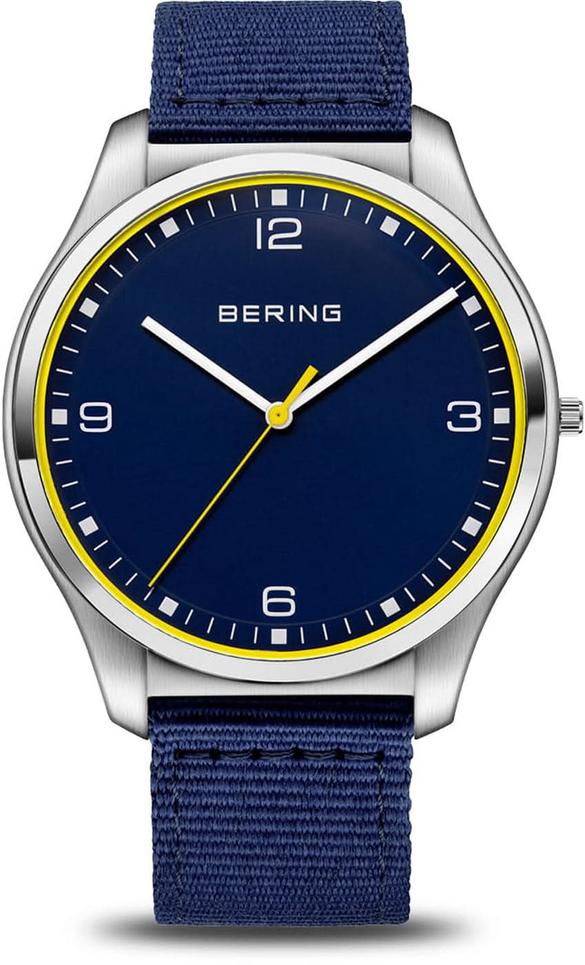 Montre homme avec bracelet en tissu bleu, cadran bleu et lunette en acier argenté