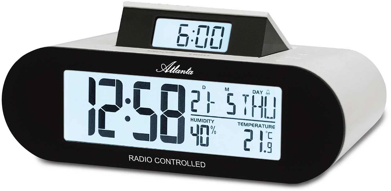 Radio-réveil numérique avec grand affichage ; affiche l'heure, la date, la température et l'humidité.