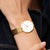 Bering Damenuhr am Handgelenk mit goldfarbenem Titan-Gliederarmband und weißem Zifferblatt