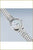 Bracelet de montre pour femme avec couronne sur le boîtier et bracelet en métal argenté