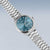 Montre pour femme avec cadran bleu et bracelet en acier inoxydable, vue latérale