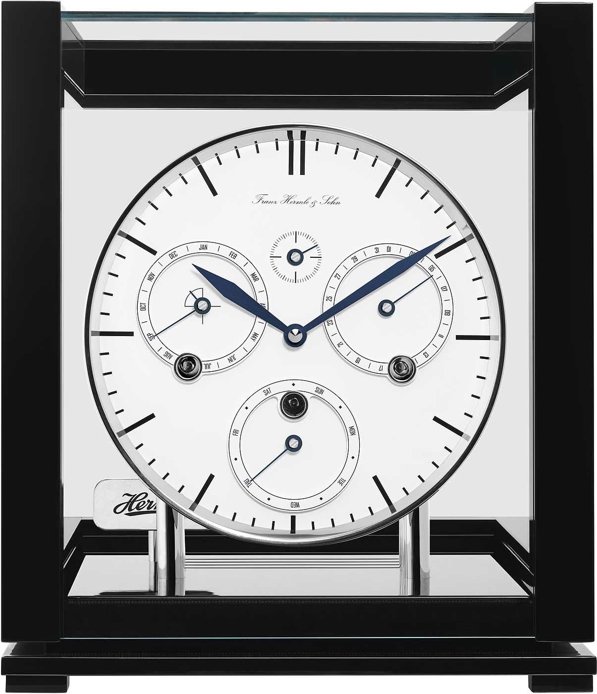 Horloge de table avec cadran blanc, aiguilles bleues et cadre en bois sombre