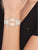 Bicolor-Damenarmbanduhr mit rosafarbenem Zifferblatt und Edelstahlarmband, silber/gold