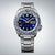 Herrenuhr mit blauem Zifferblatt, Edelstahlband, Datumsanzeige und blau-weißem Lünette