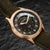 Holzkern Wildlight Solararmbanduhr mit moosgrünem Zifferblatt und goldfarbenem Gehäuse