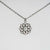 Collier avec pendentif rond en nacre design soleil, métal argenté