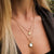 Collier plaqué or avec pendentif cercle en nacre et petit motif cercle