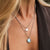 Collier superposable en argent avec deux pendentifs ronds : motif nacre et breloque à pois