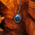 Collier en or avec pendentif en pierre bleue ovale et chaîne à maillons