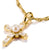 Charm croix plaqué or avec perle et zirconias transparents, sur passant avec cordon