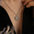 Collier en argent avec pendentif lune en pierre de lune ronde, monture florale