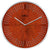 Horloge murale ronde avec cadre en métal et cadran aspect rouille, index bâtons et aiguilles.