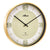 Horloge murale avec boîtier rond en métal doré, cadran blanc et aiguilles noires