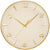 Horloge murale dorée avec cadran beige, chiffres et aiguilles dorés.