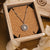 Collier en argent avec pendentif lune en pierre de lune ronde, monture ornementale