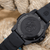 Montre homme avec bracelet noir en Carbonox et fond transparent avec logo Navy Seal