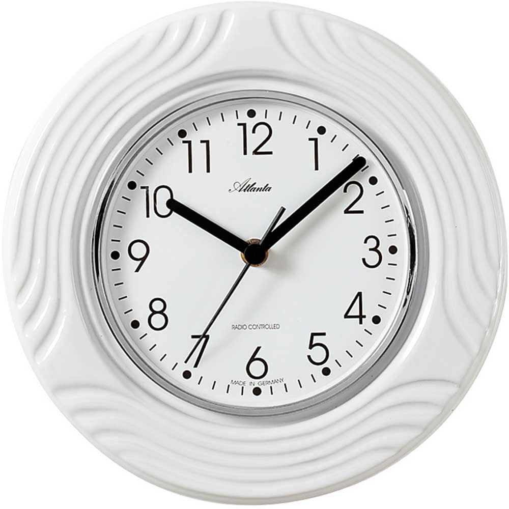 Horloge murale blanche en céramique avec chiffres arabes et jeu d'aiguilles noir