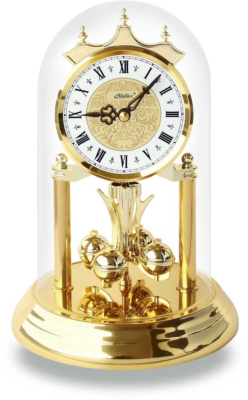 Horloge de table en laiton avec cloche en verre, chiffres romains et mécanisme apparent