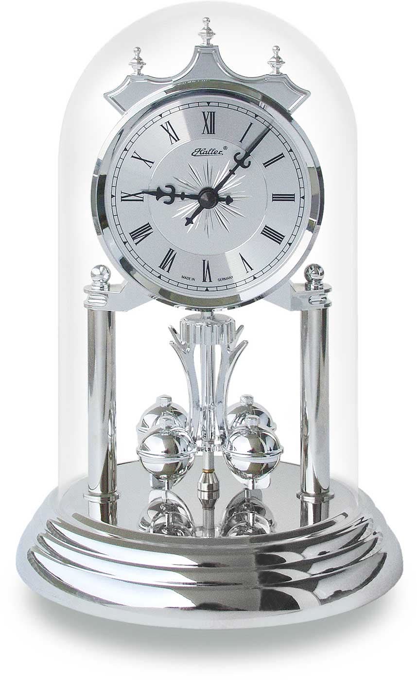 Table de chevet avec boîtier argenté, cadran romain et verre bombé