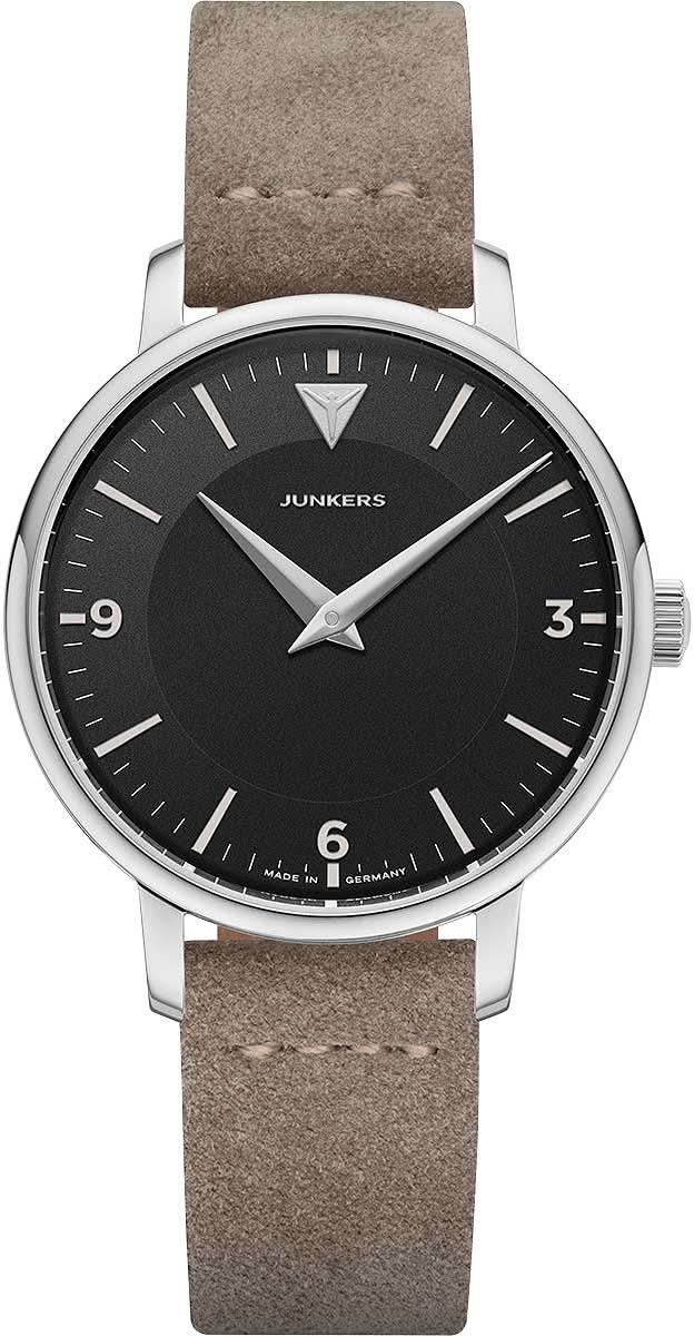 Montre pour femme : cadran noir, boîtier argenté, bracelet en cuir marron