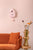 Horloge murale rose en forme de maison avec pendule