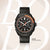 Chronographe pour homme avec cadran noir, compteurs de chronographe et bracelet en cuir noir