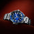 Herrenarmbanduhr mit blauem Zifferblatt und Edelstahlband, Lünette mit Ziffern