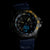 Montre pour homme avec lunette et cadran lumineux, bracelet bleu foncé et date.