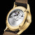 Bracelet de montre pour homme avec mouvement apparent, boîtier doré et bracelet en cuir foncé