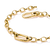 Bracelet gourmette plaqué or avec fermoir mousqueton et deux breloques brillantes