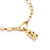 Pendentif breloque doré en forme d'ours, vue de côté