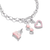 Collier en argent avec plusieurs breloques, dont un cœur rose et un cadre en forme de cœur