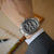 Montre pour homme au poignet : cadran noir avec bracelet à maillons en acier inoxydable