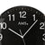 Radio-horloge murale AMS avec cadran noir, chiffres blancs, aiguilles et logo AMS