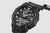 G‑SHOCK GA‑B010 Herrenuhr in Schwarz, schräger Blick auf Gehäuse und Bedienelemente