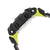Boucle G-Shock avec ardillons en métal, bracelet noir et contours verts.