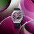 Casio G-Shock Herrenuhr mit violettem Zifferblatt und schwarzem Harzarmband im Detail