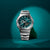 G-Shock Herrenarmbanduhr mit Metallarmband und türkisfarbenem Zifferblatt