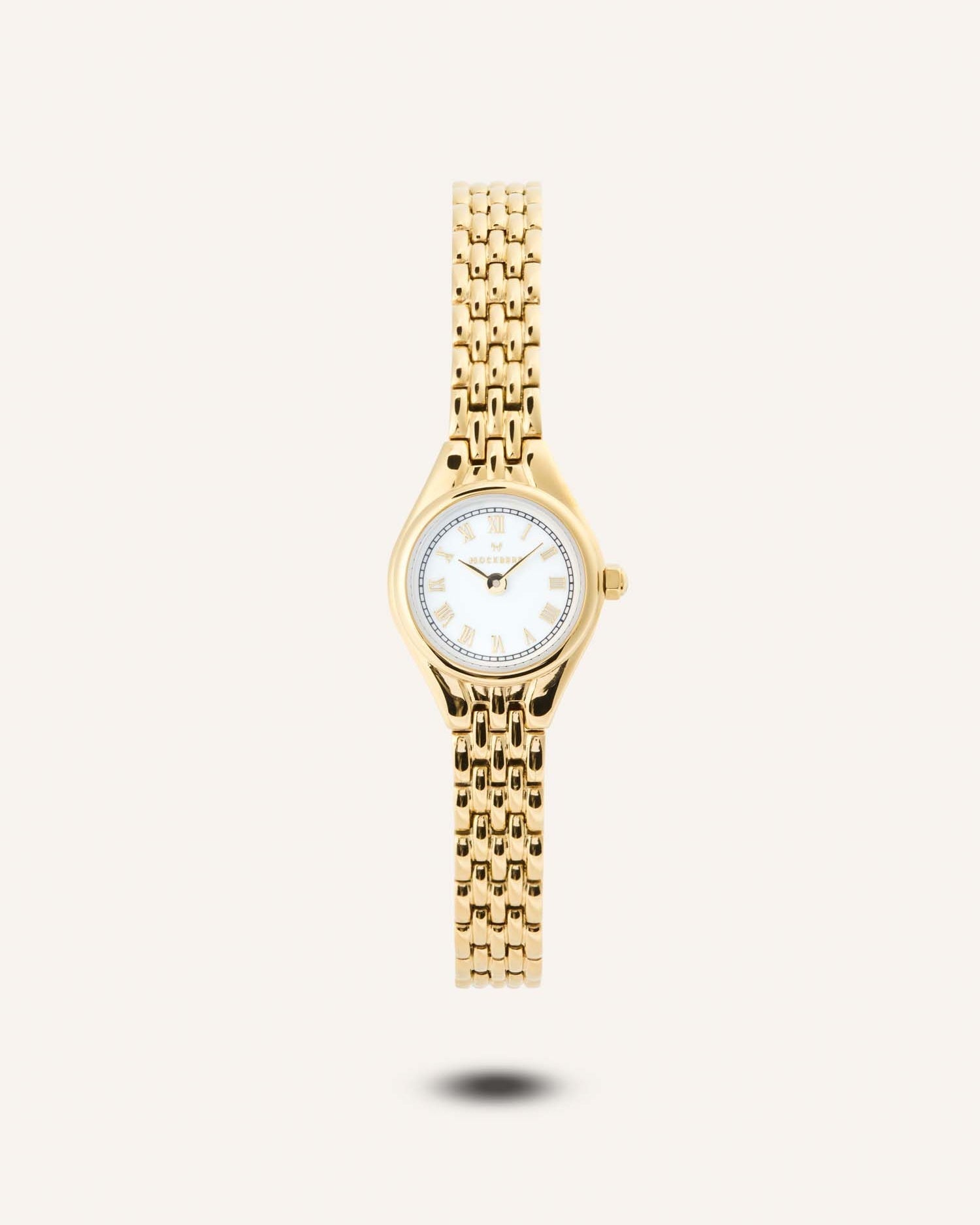 Mockberg Heritage Damenarmbanduhr mit goldfarbenem Metallarmband und weißem Zifferblatt