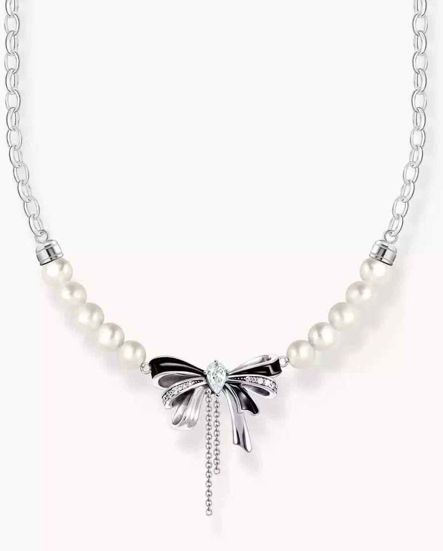 Chaîne à maillons avec perles : chaîne à maillons argentée avec nœud et perles blanches