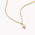 Collier femme doré avec pendentif rond en zircone, design multi-pierres