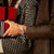 Montre pour homme Bulova au poignet avec bracelet en métal et cadran rouge