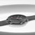 Herrenarmbanduhr mit schwarzem Zifferblatt und Metallband im Mesh-Look