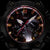 Herrenarmbanduhr Zifferblatt-Detail: schwarzes MR-G Zifferblatt mit roten Anzeigen und goldenen Indexen